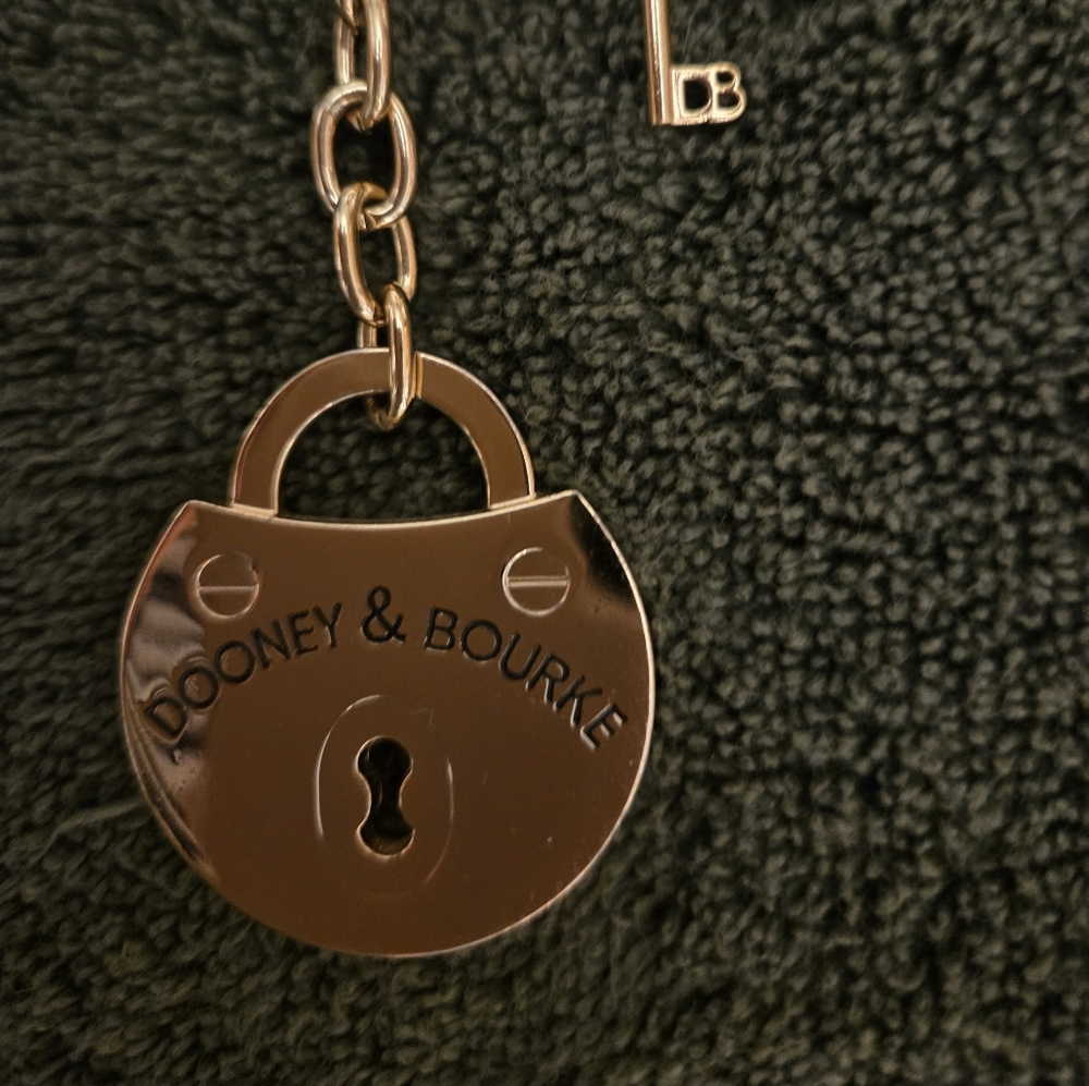 Dooney and bourke purse charm, keyring with the doony clip . dooney lock and key